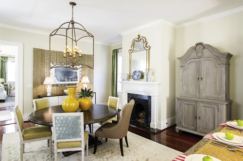 In the dining room, a prayer screen and a contemporary pen-and-ink piece purchased from a Hong Kong gallery nod to the Feinbergs’ frequent trips to China. Post-reno, widened doorways provide a partial view of the parlor, drawing the eye further into the home.