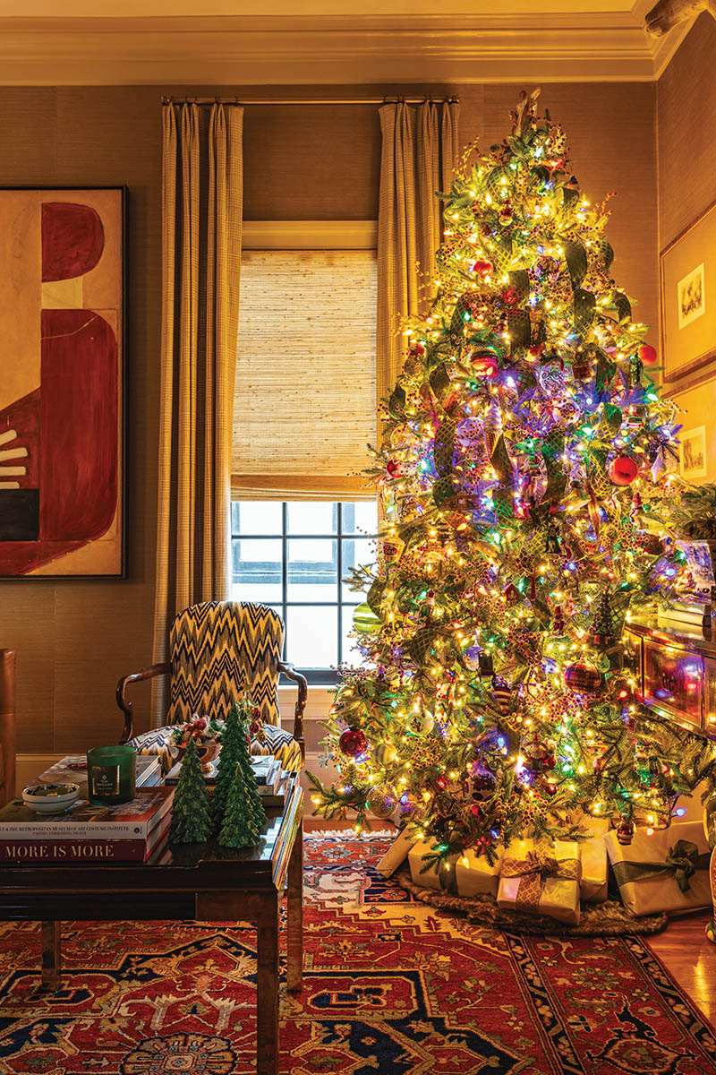 In a cozy room off the kitchen, the “family” tree is a picture of nostalgia, featuring the couple’s childhood ornaments and vintage GE String-A-Long Classic Lights, just like John grew up with.