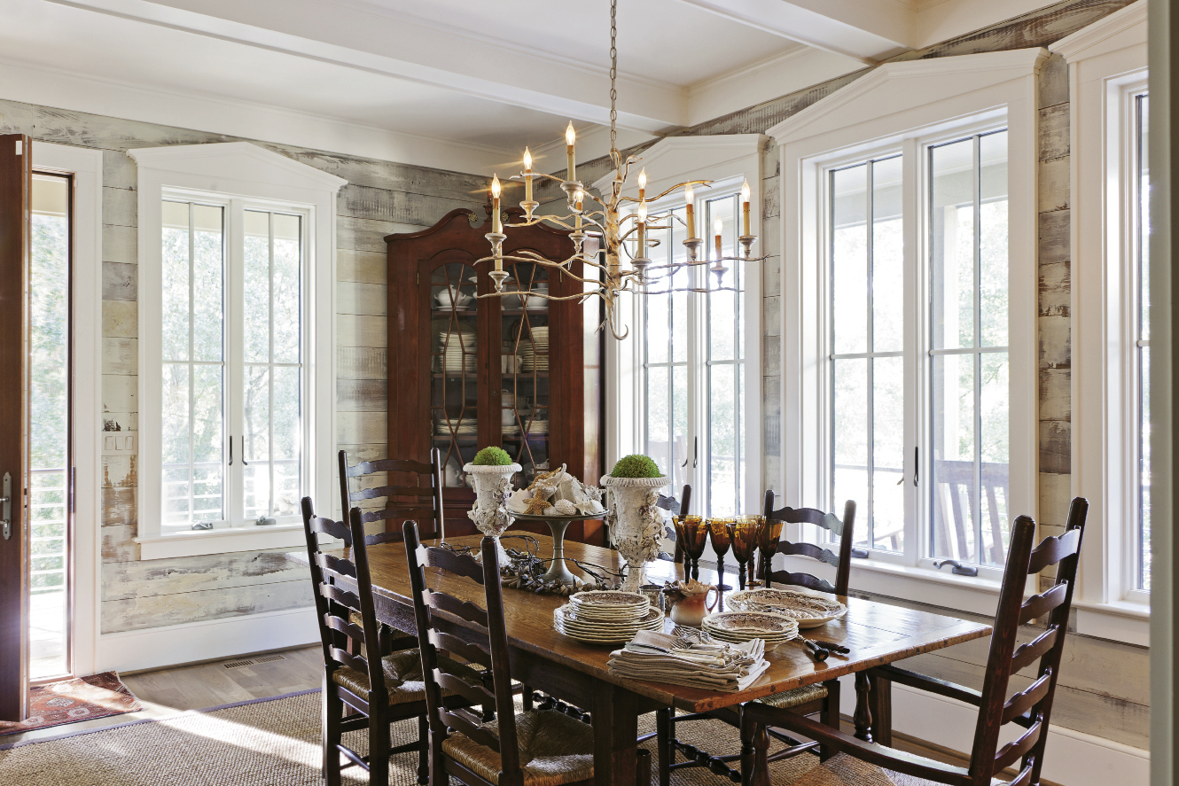 Becky Hollingsworth worked alongside a local artist to faux-age the cypress beams in the dining room.