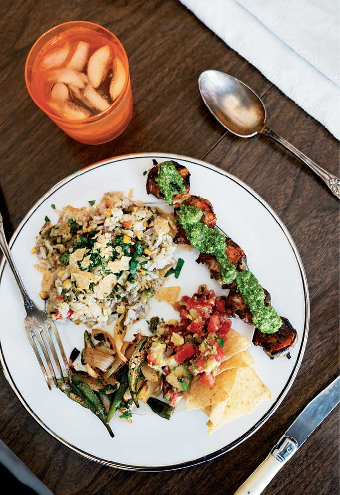 Rice with poblano peppers, shrimp spread with cilantro pesto, and spicy okra kick up the heat.