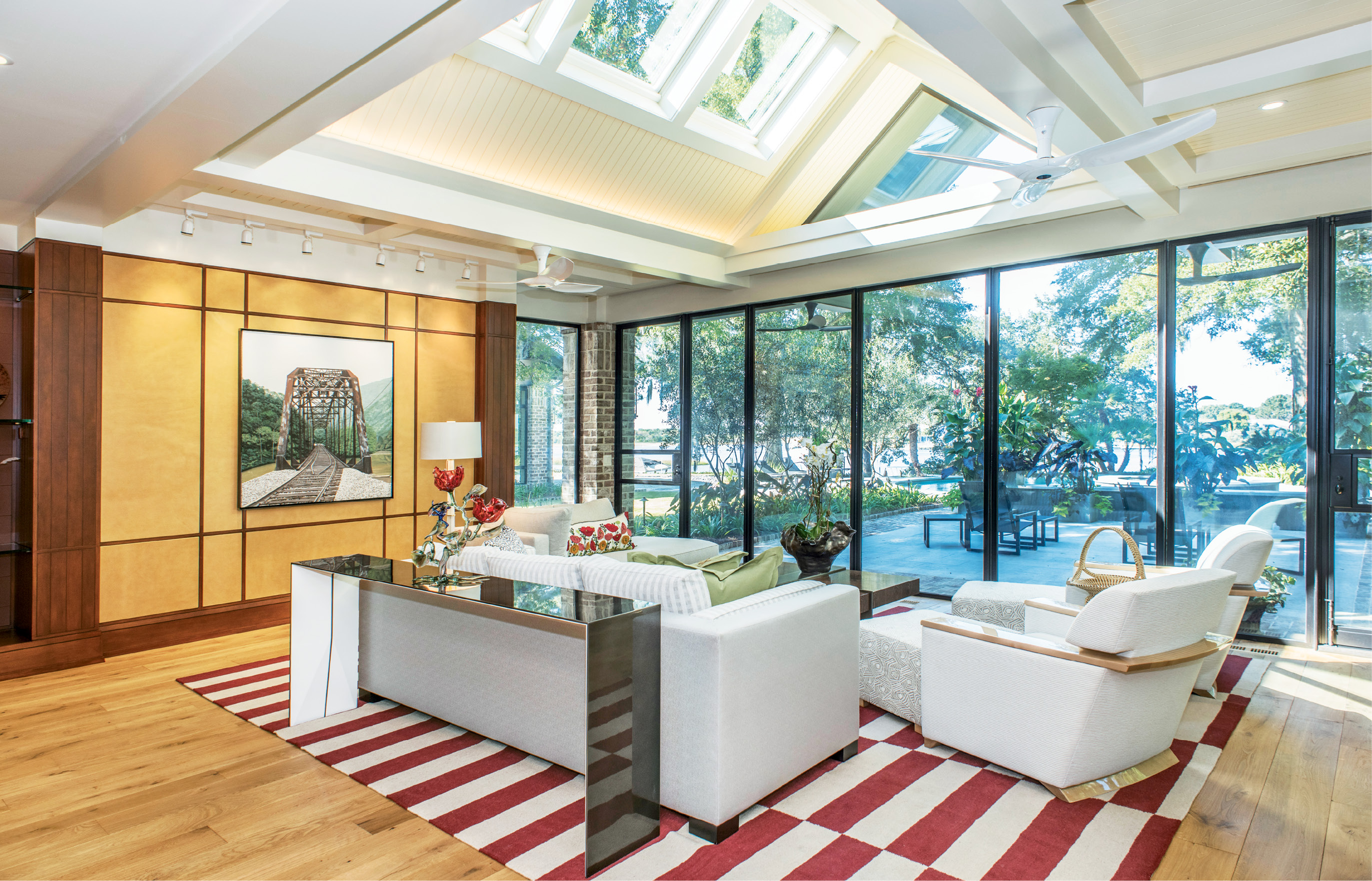 An Easy Out: Contemporary, casual, and flooded with light, the den is a sun-room and then some.