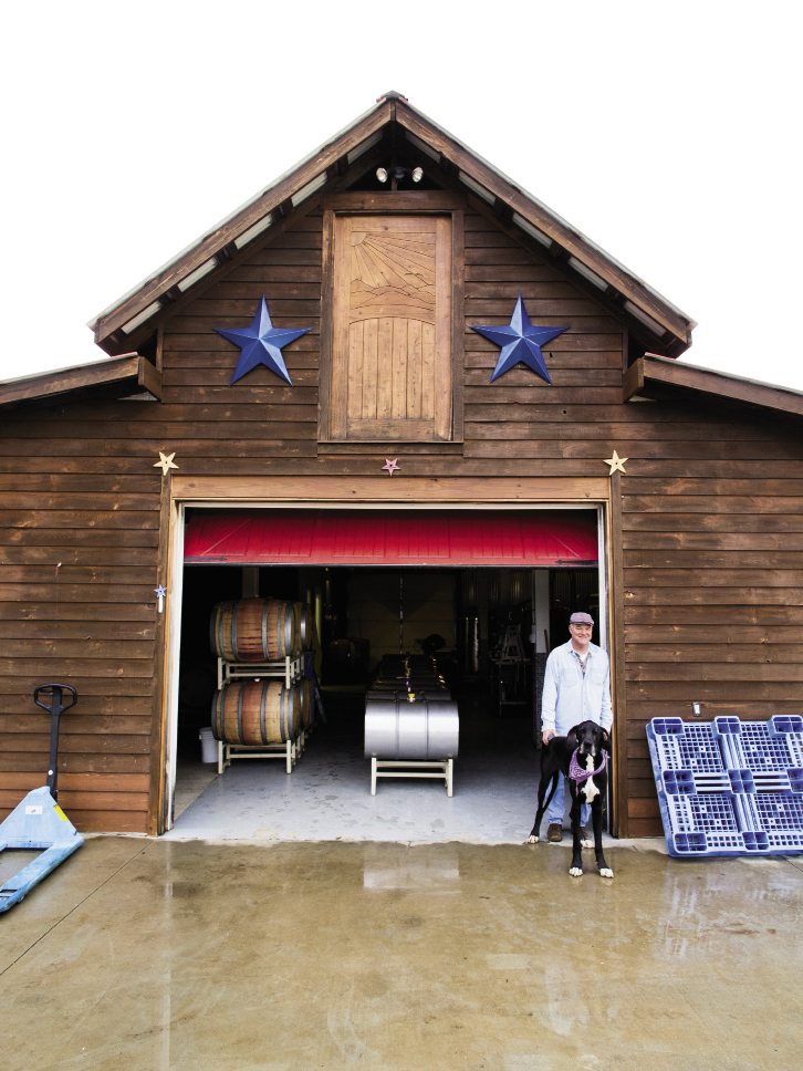 Frank Lilly and his dog, Jackson, at Overmountain Vineyards