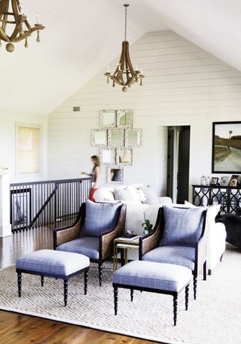Room With Views: White shiplap creates a blank canvas to highlight intriguing shapes and textures, like handsome recovered furniture, show-stealing chandeliers, oyster-shell mirrors—even the ebb and flow of the Atlantic right outside.