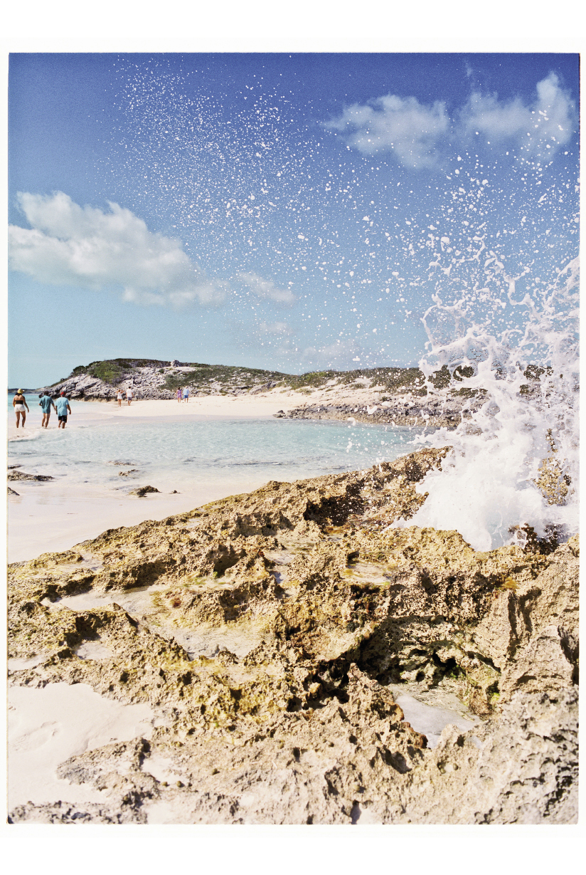 Sea spray whooshing from a coral formation near the Tropic of Cancer