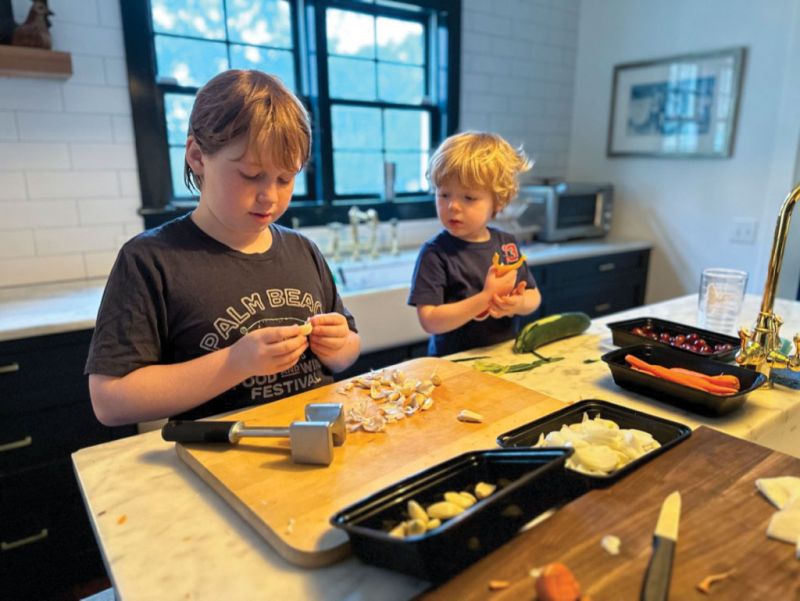 Sharing the Knowledge: “I’ve got three kids [Henry and Oscar (above)], so teaching them about food has become very important to me.”
