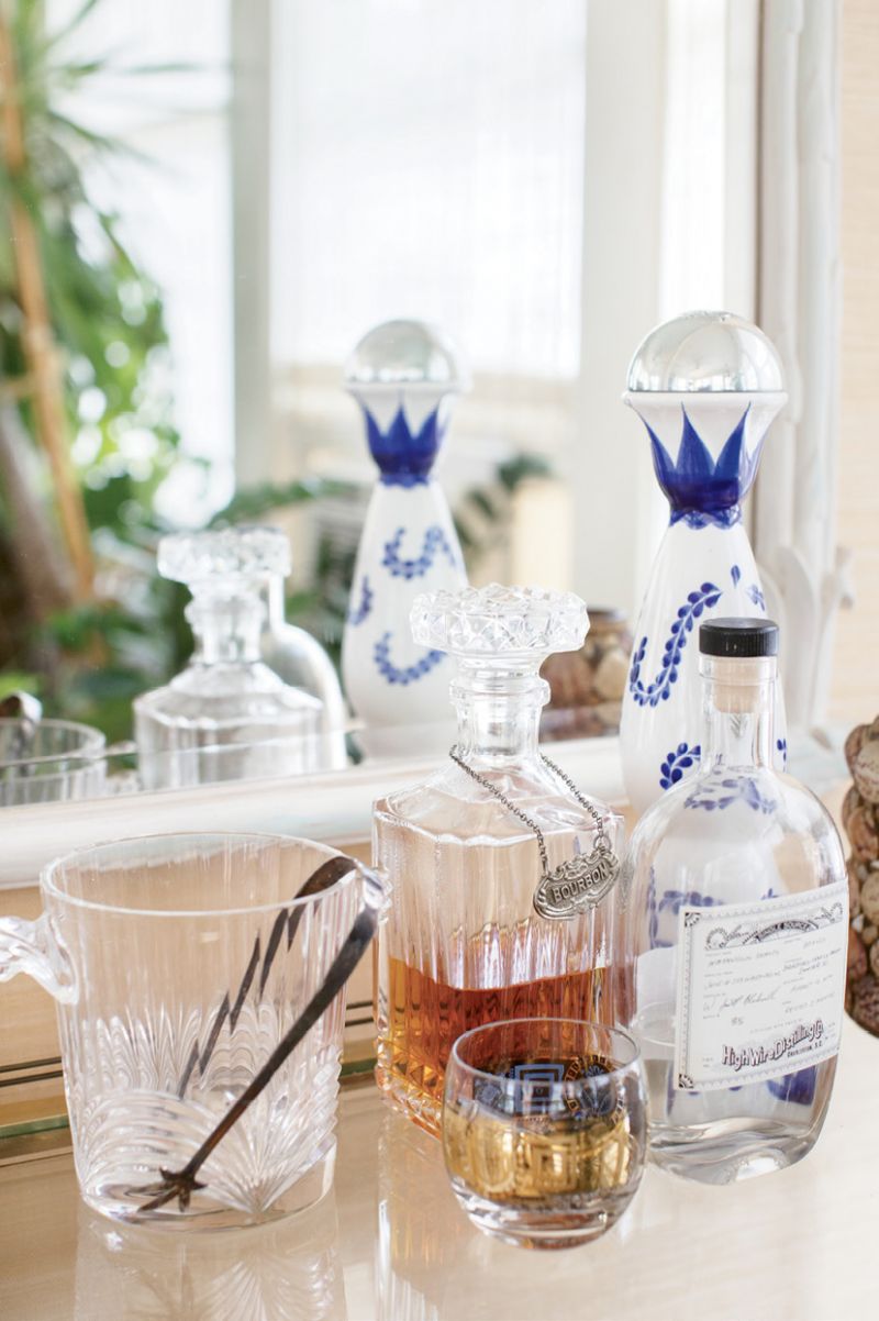 Cocktails and conversation flow in the welcoming home of Dr. Melvin and Deborah Brown. He’s known for his cooking and mixology skills and she, an avid collector, dresses the eclectic interiors.