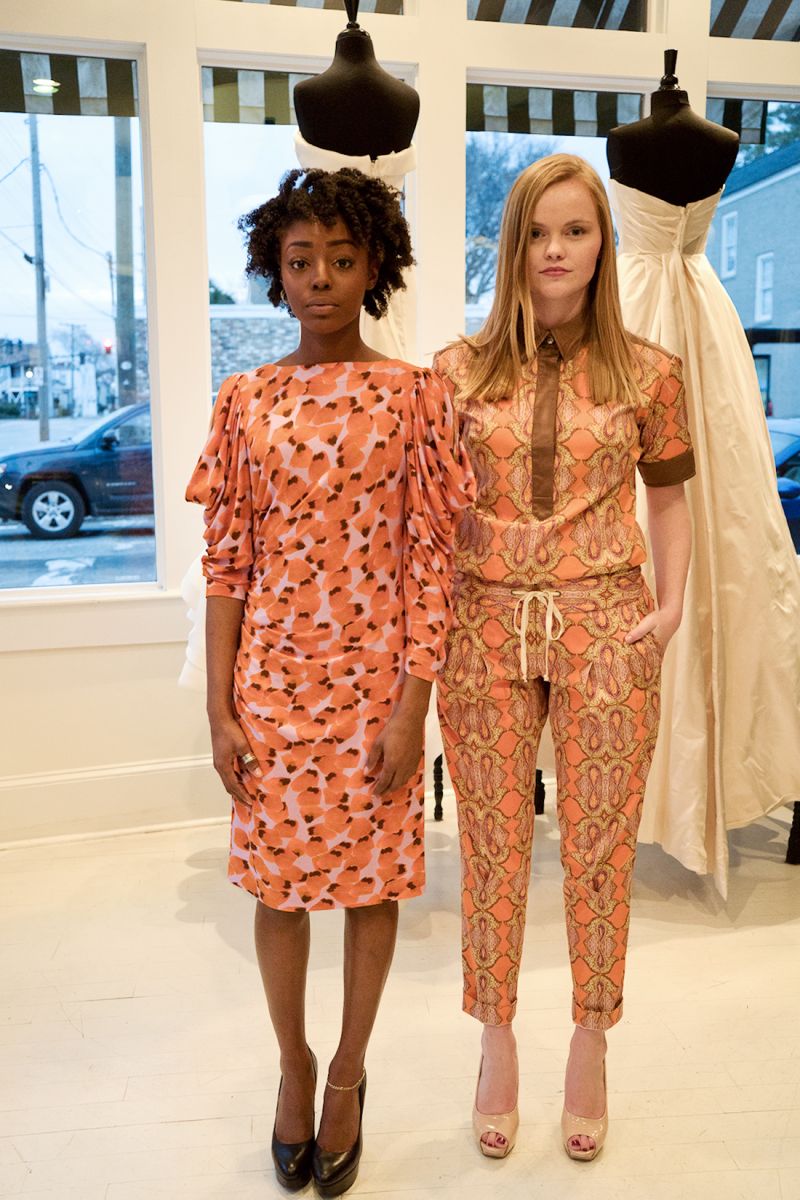 Venita Aspen in the floral petal print jersey dress ($545) and Taylor Brobisky in the Karma print blouse ($385) and trouser ($395)
