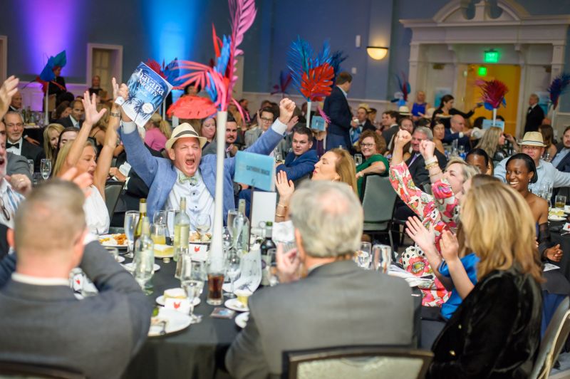 Wendy and Richard Gilder III made the winning bid for the cover of Carolina Tails magazine.
