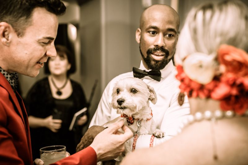 Marshall Morris and Charleston Animal Society emergency response and preparedness manager Bryant Taylor strolled through the event with adoptable pooch Pico.