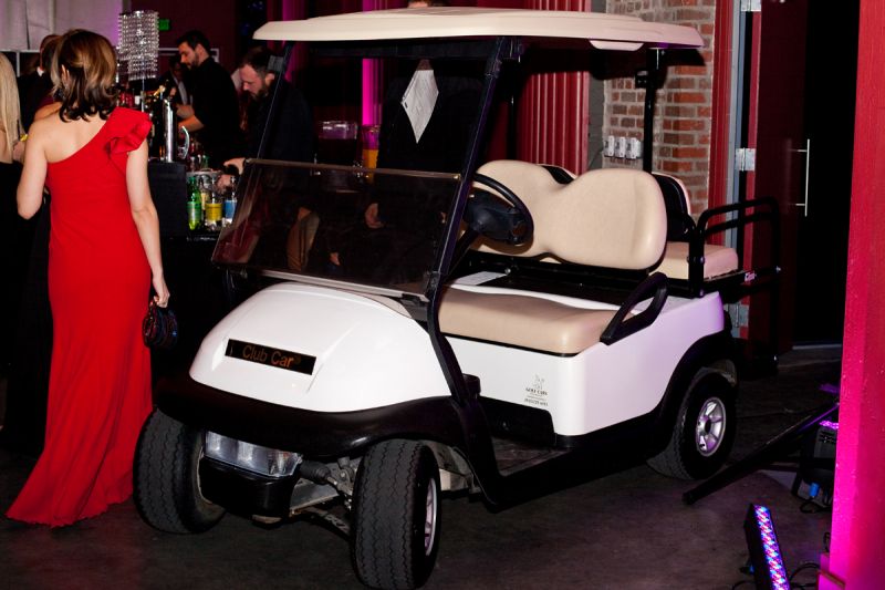 A golf cart was ready to be driven home by a lucky bidder.