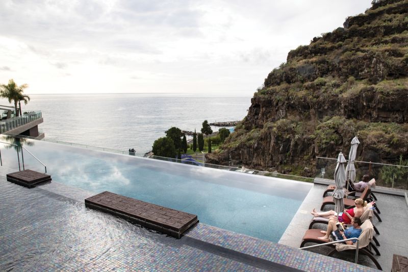 Saccharum Resort &amp; Spa, another Savoy Signature property, overlooks the coast near Calheta.