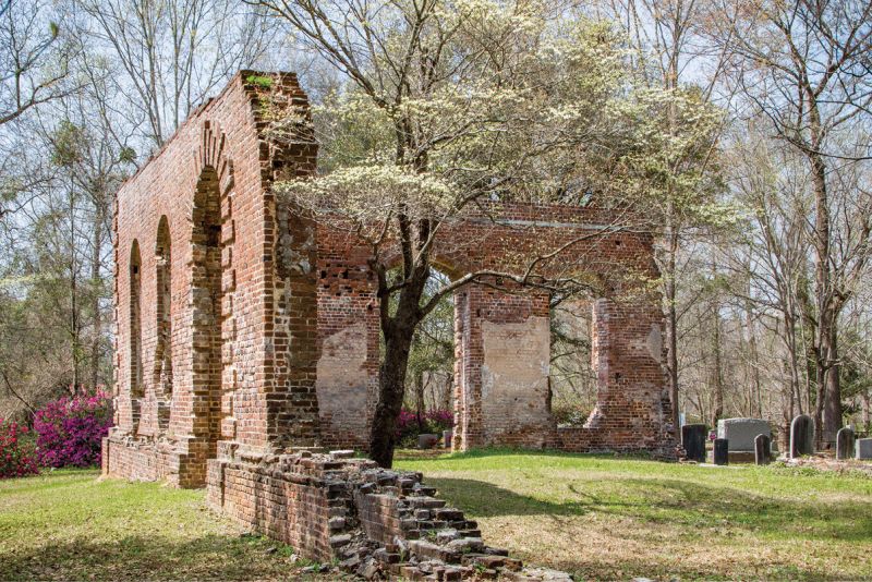 The property near Moncks Corner was listed in the National Register of Historic Places in 1977: “Notable architectural details which remain include a Gibbs surround at the main portal, quoins at the corner, radiating voussoirs over the windows, and a rounded water table.”