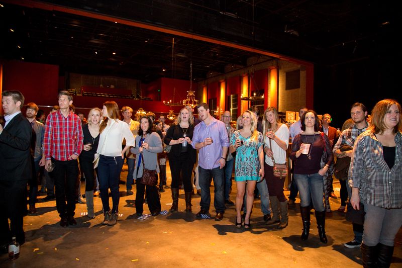 Guests gather around the band towards the end of the night.
