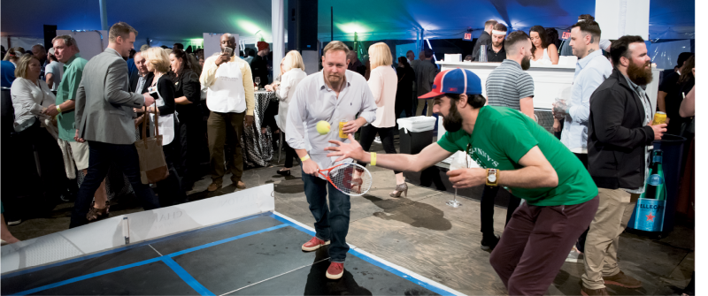 Guests got competitive while playing miniature tennis.