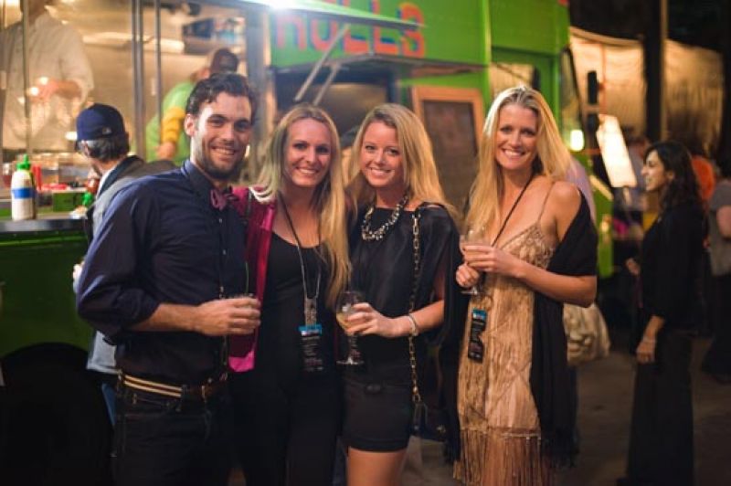 Adam Ashbrook, Brittany Thomson, Chelsea Price-Ashbrook, and Taylor Vickery start the night off with a stop by the Roti Rolls truck