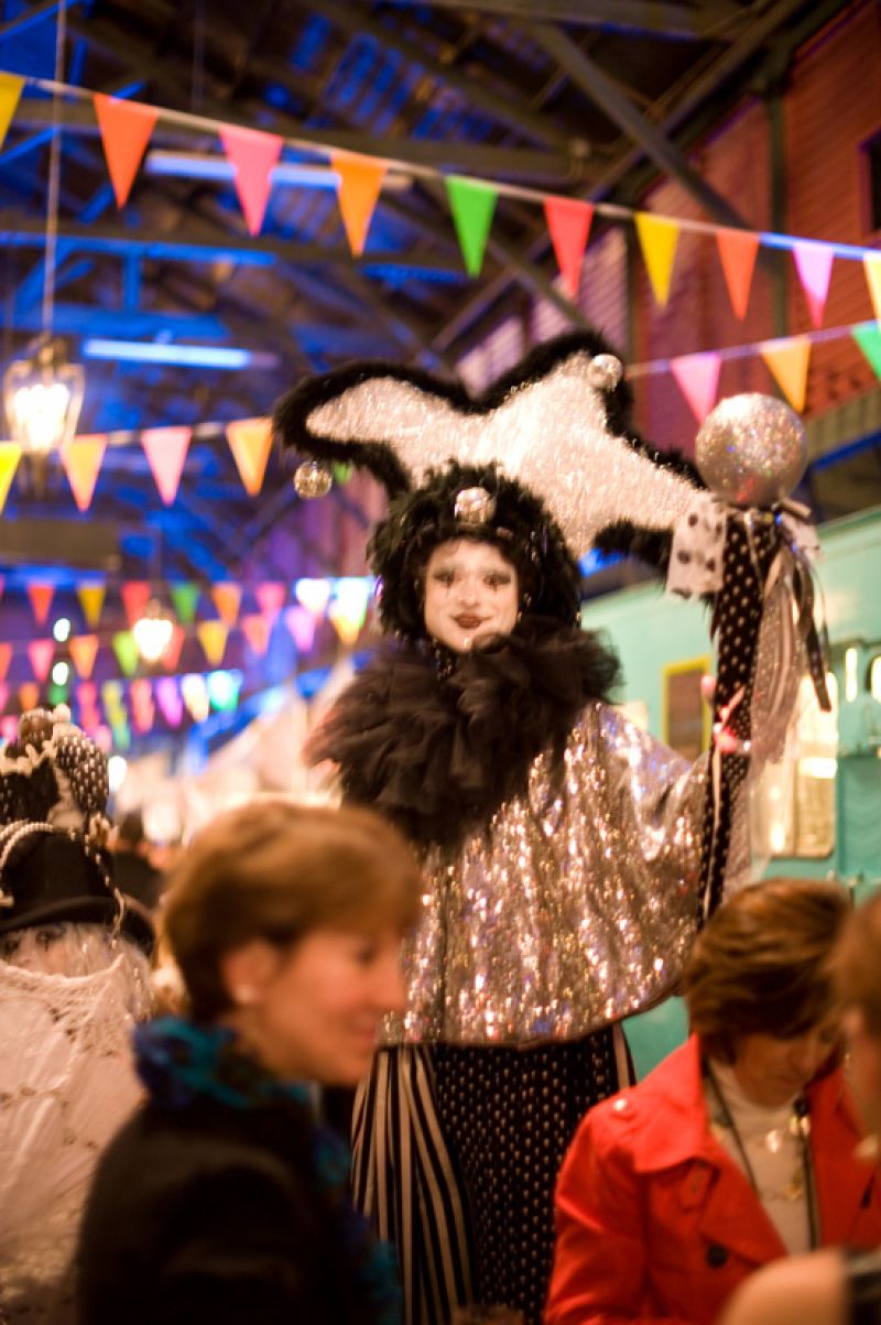 Need help finding someone? Look no further than the stilt walker from Theatre Marvelosa as he hovers over the crowd
