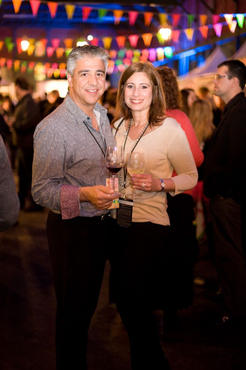 Who says red and white wine don&#039;t mix? Ab and Adrianna Sanchez sample some of the lovely wine of the party