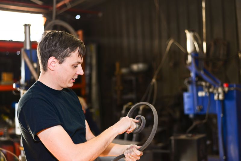 Peyton Avrett showed tour-goers how he shapes an ornamental scroll.