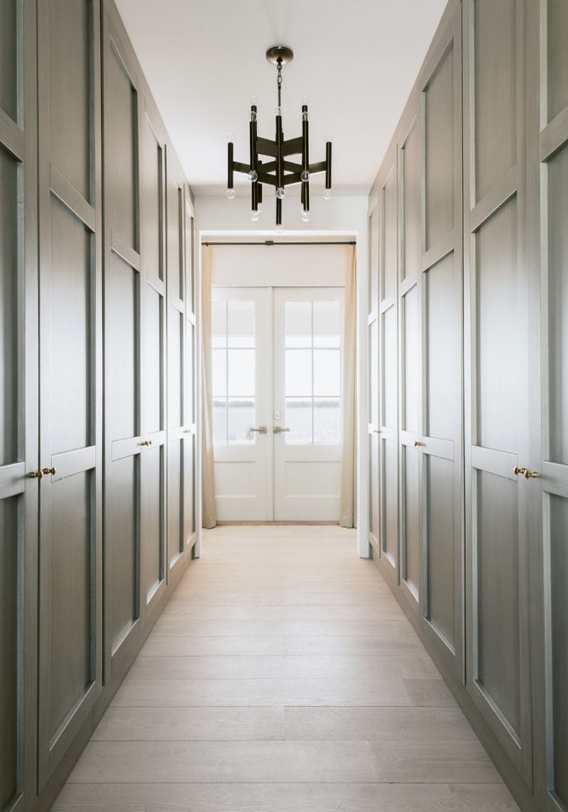 Even the his-and-her closets, which separate the bedroom and bath, provide harbor views.