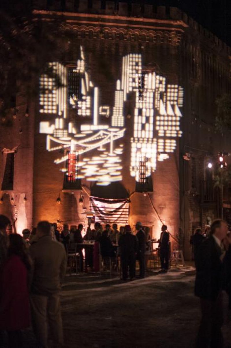 A stunning image of Manhattan projected onto the side of the jail